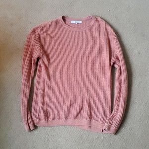 Pink knitted sweater